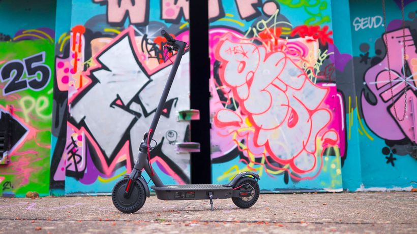 Electric Scooter on Graffiti Background