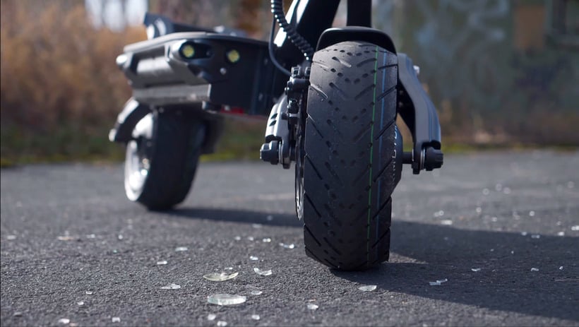 Electric Scooter Tire Rolling Over Glass